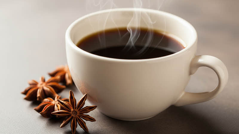 A cup of coffee with star anis