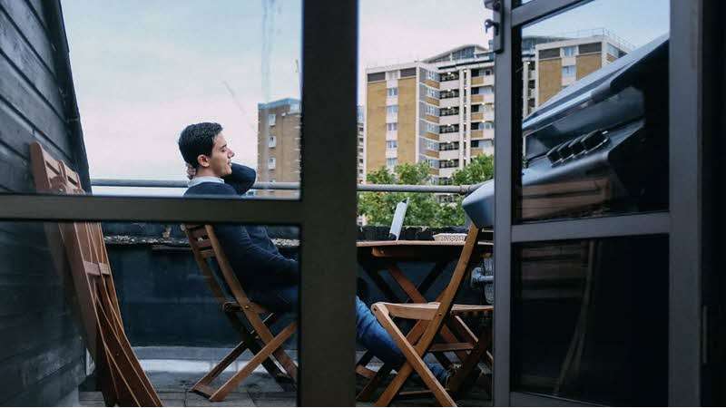 Man contemplating on terrace